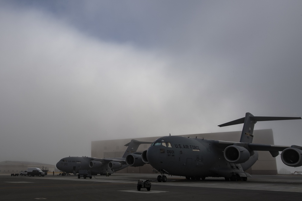 C-17s in the morning fog