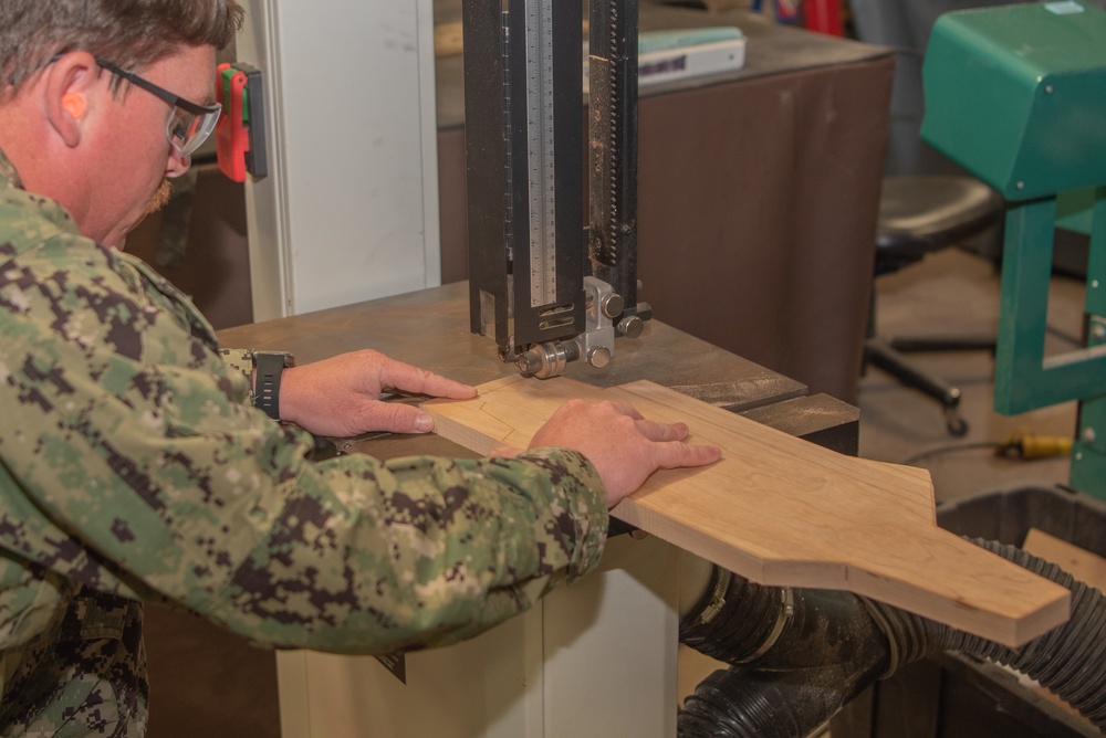 George Washington Sailor Cuts Wood