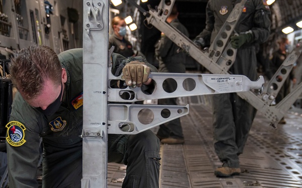 729th AS provides airlift for 452 AES check rides