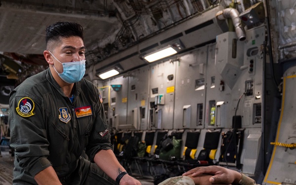 729th AS provides airlift for 452 AES check rides