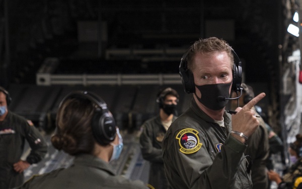 729th AS provides airlift for 452 AES check rides