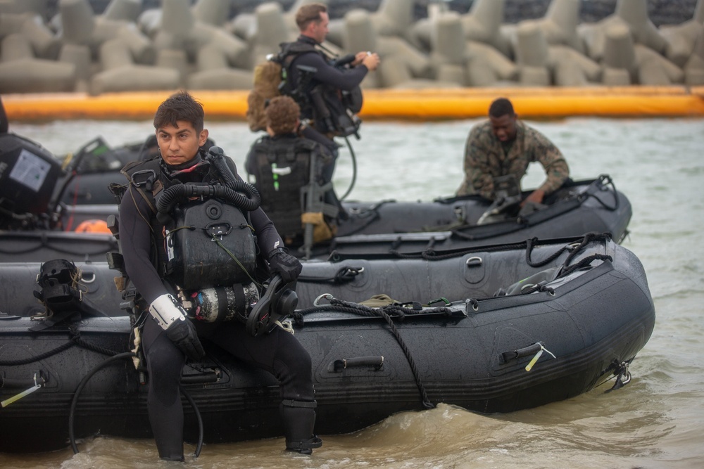 Suit Up: Marines with the Amphibious Reconnaissance Platoon prepare to conduct clandestine subsurface infiltration