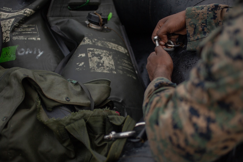 Suit Up: Marines with the Amphibious Reconnaissance Platoon prepare to conduct clandestine subsurface infiltration