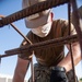 Seabees assigned to Naval Mobile Construction Battalion (NMCB) work on reinforcement bars for concrete footers and grade beams during a military working dog kennel project on board Naval Station Rota, Spain.