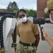 Aircrew Survival Equipmentman 2nd Class Kimberly Watson, assigned to USS Constitution, gives a Facebook live gun drill demonstration