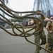Sailors assigned to USS Constitution demonstrate how guns would have been fired during the age of sail