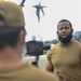 Retail Specialist 1st Class Kenneth Johnson, assigned to USS Constitution, gives a Facebook live gun drill demonstration