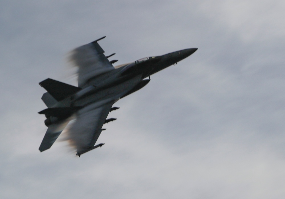 F/A-18E Super Hornet flies over Ralph Johnson