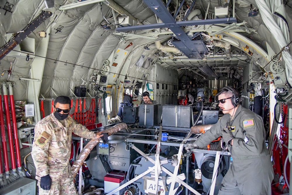 Yokota, Misawa work together, refuel F-16 from C-130J