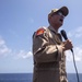 USS New York's Commanding Officer speaks during all hands call