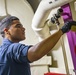 Sailors clean aboard New York