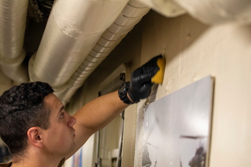 Sailors clean aboard New York