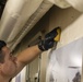 Sailors clean aboard New York