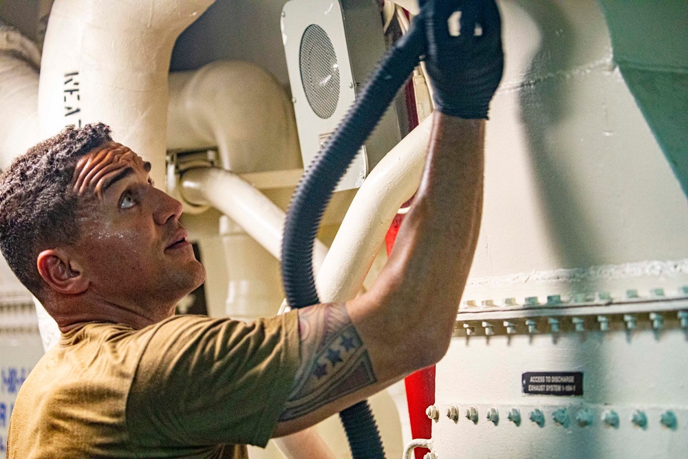 Sailors clean aboard New York