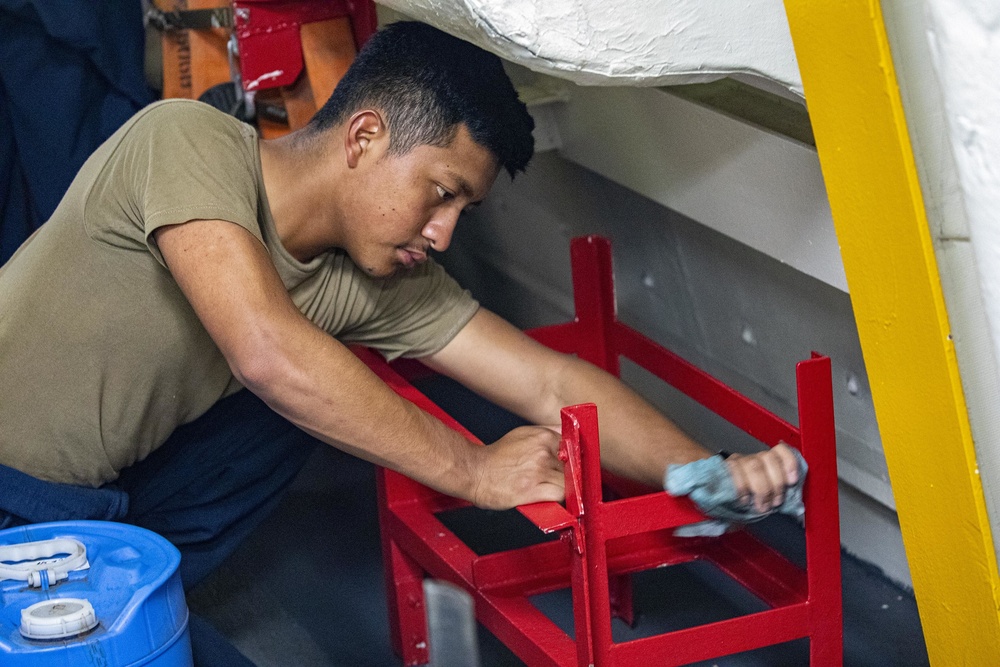 Sailors clean aboard New York