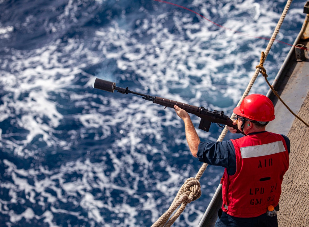 Sailors take part in a replenishment-at-sea