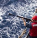 Sailors take part in a replenishment-at-sea