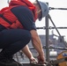 Sailors take part in a replenishment-at-sea