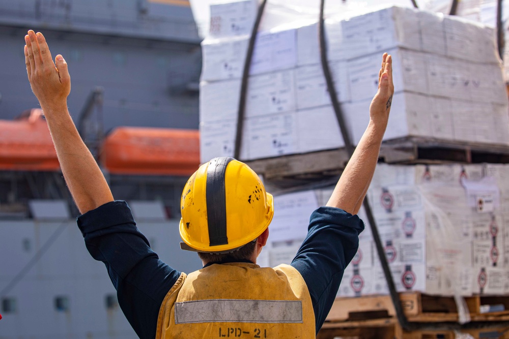 Sailors take part in a replenishment-at-sea