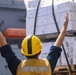 Sailors take part in a replenishment-at-sea