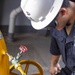 Sailors take part in a replenishment-at-sea