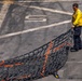 Sailors take part in a replenishment-at-sea