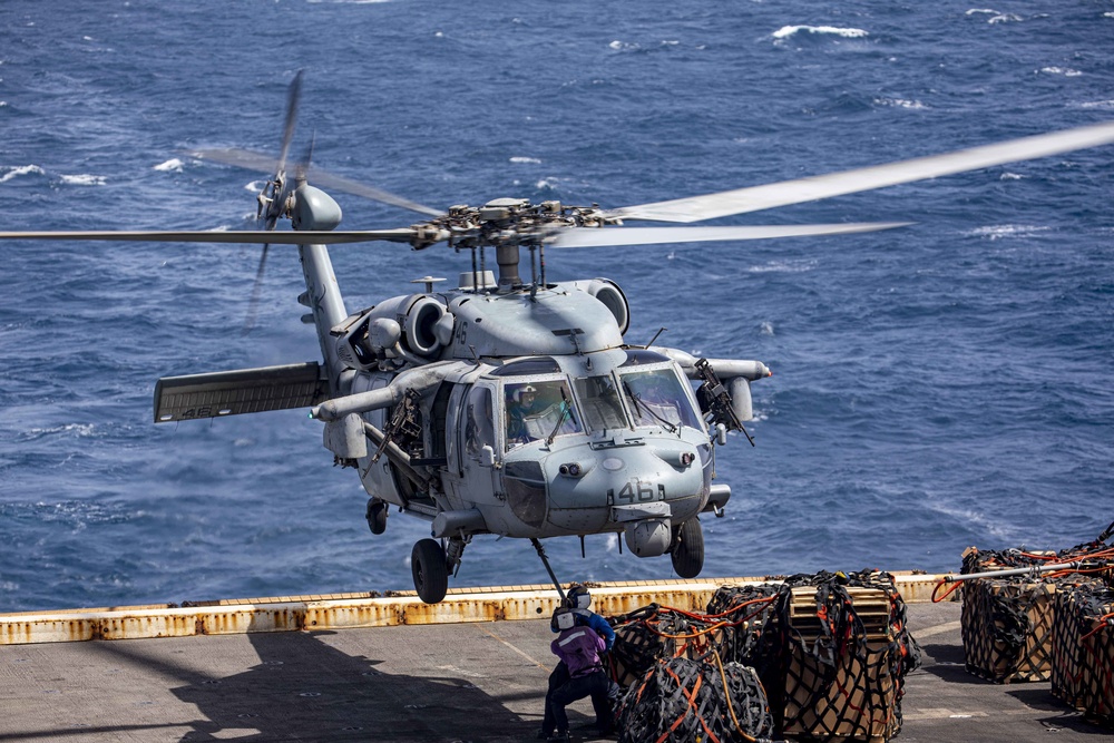 Sailors take part in a replenishment-at-sea