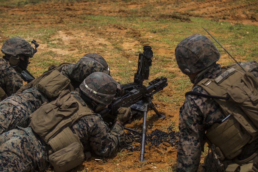 III MEF Marines work on combat proficiency with the M240B medium machine gun
