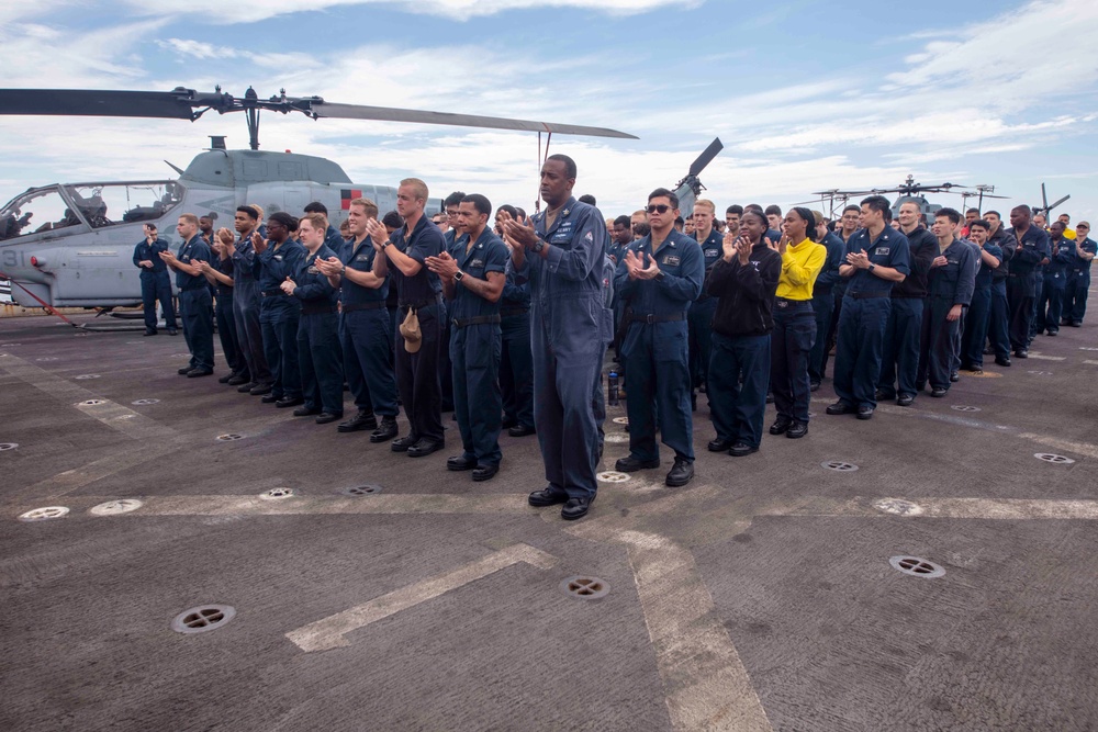 Sailors attend a All hands call abord the USS New York