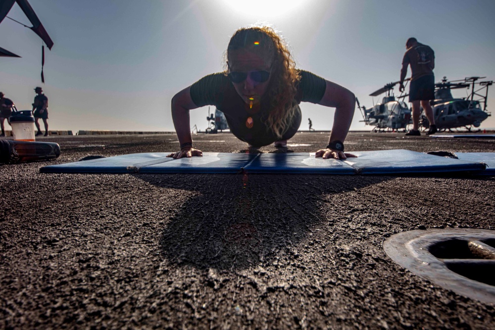 Sailors and Marines take part in the MURPH exercise