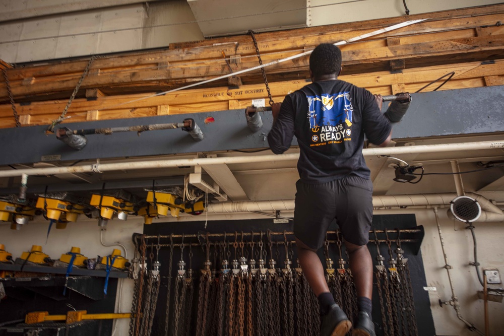 Sailors and Marines take part in the MURPH exercise