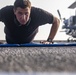 Sailors and Marines take part in the MURPH exercise