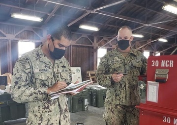 U.S. Navy Seabees with NMCB-5, Detail Sasebo, prepare for turnover