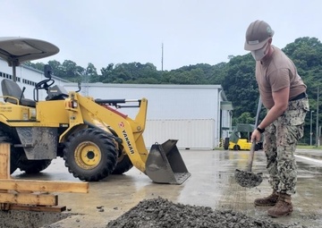 U.S. Navy Seabees with NMCB-5, Detail Sasebo, support Naval Beach Unit 7