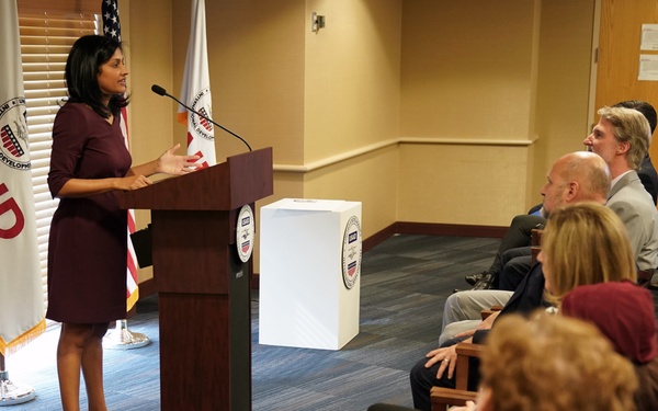 Signing in ceremony for Anu Rajaraman as Mission Director of Guatemala