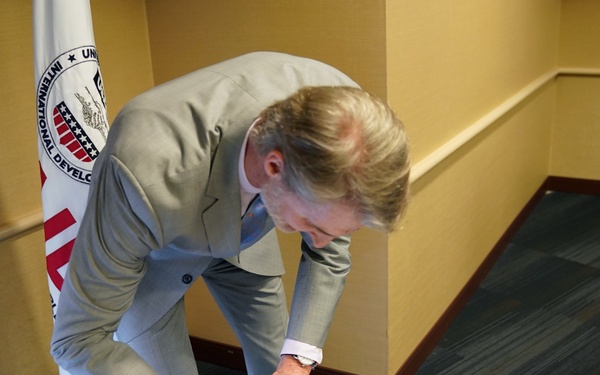 Signing in ceremony for Anu Rajaraman as Mission Director of Guatemala