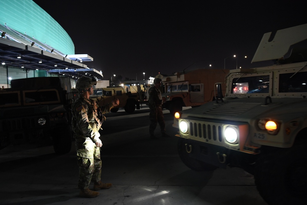 Cal Guard Soldiers arrive at the Los Angeles Convention Center to respond to civil unrest in Los Angeles