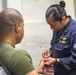 Sailors receive spa treatment for fathers day aboard the USS New York