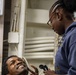 Sailors receive spa treatment for fathers day aboard the USS New York