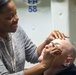 Sailors recieve spa treament for fathers day aboard the USS New York