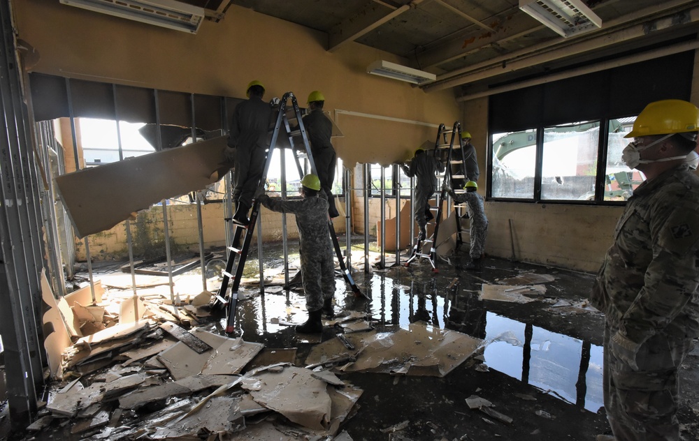 502nd Bridge Company demolishes two buildings to make space for equipment