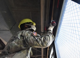 502nd Bridge Company demolishes two buildings to make space for equipment