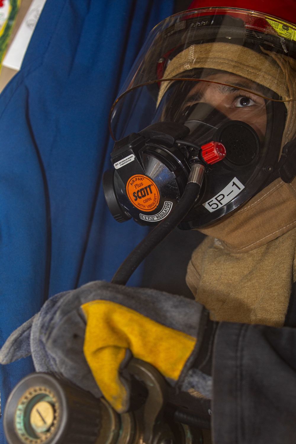 Sailors take part in a general quarters drill