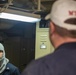 Sailors take part in a general quarters drill