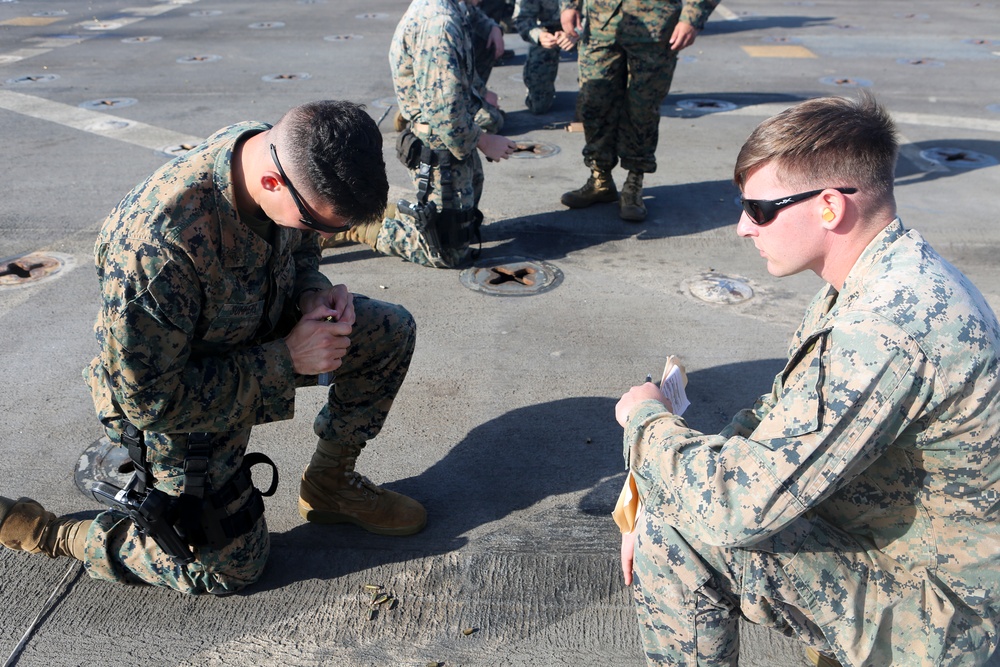 US Marines enhance pistol marksmanship aboard USS Oak Hill