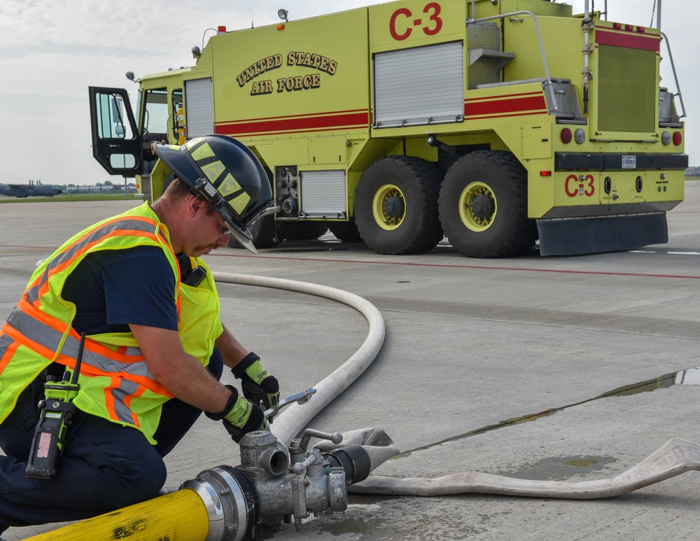 Firefighters perform KC-135 egress exercise