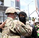 Cal Guard's 18th Cavalry Regiment Chaplain prays with protesters