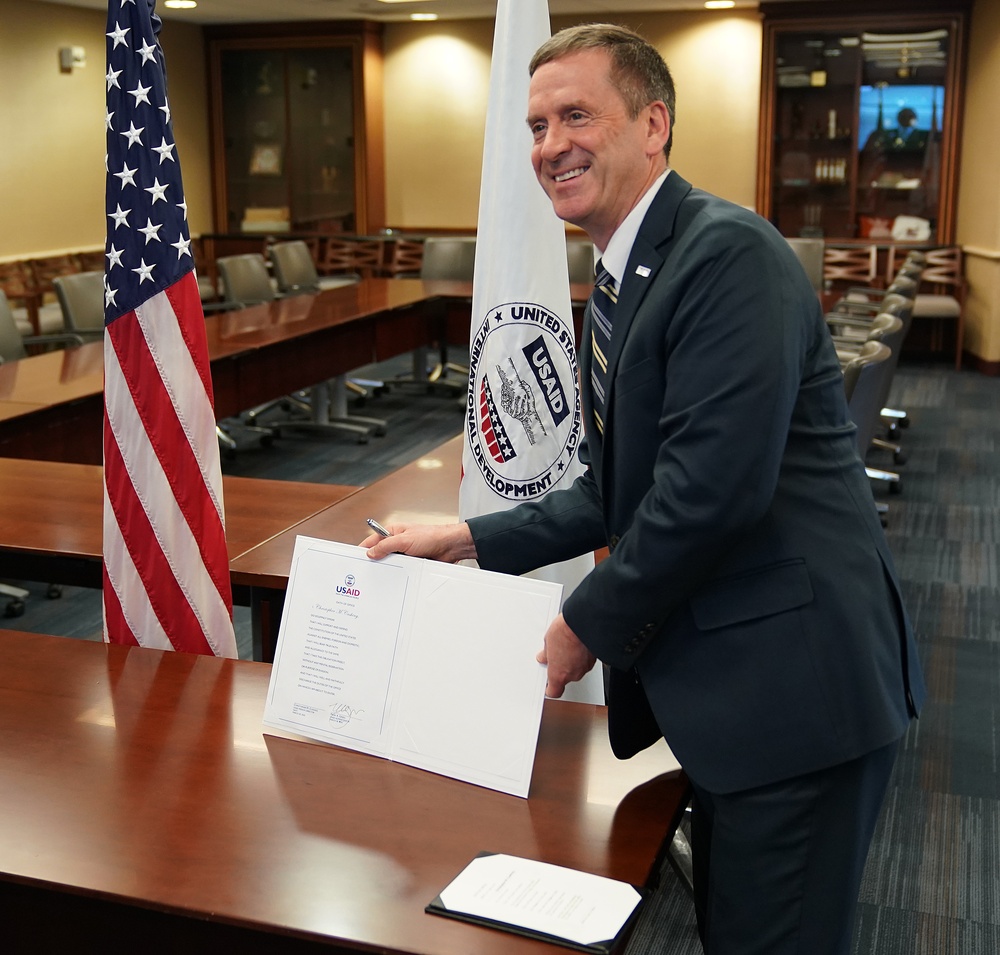 AAID Mark Green virtually signs in Chris Cushing as USAID Haiti Mission Director