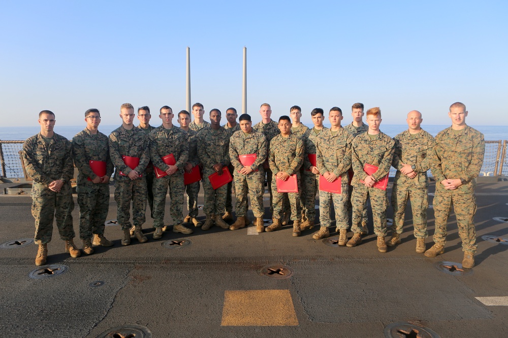 US Marines graduate corporals course aboard USS Oak Hill