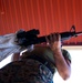 U.S. Marines clean rifles to prepare for upcoming exercises